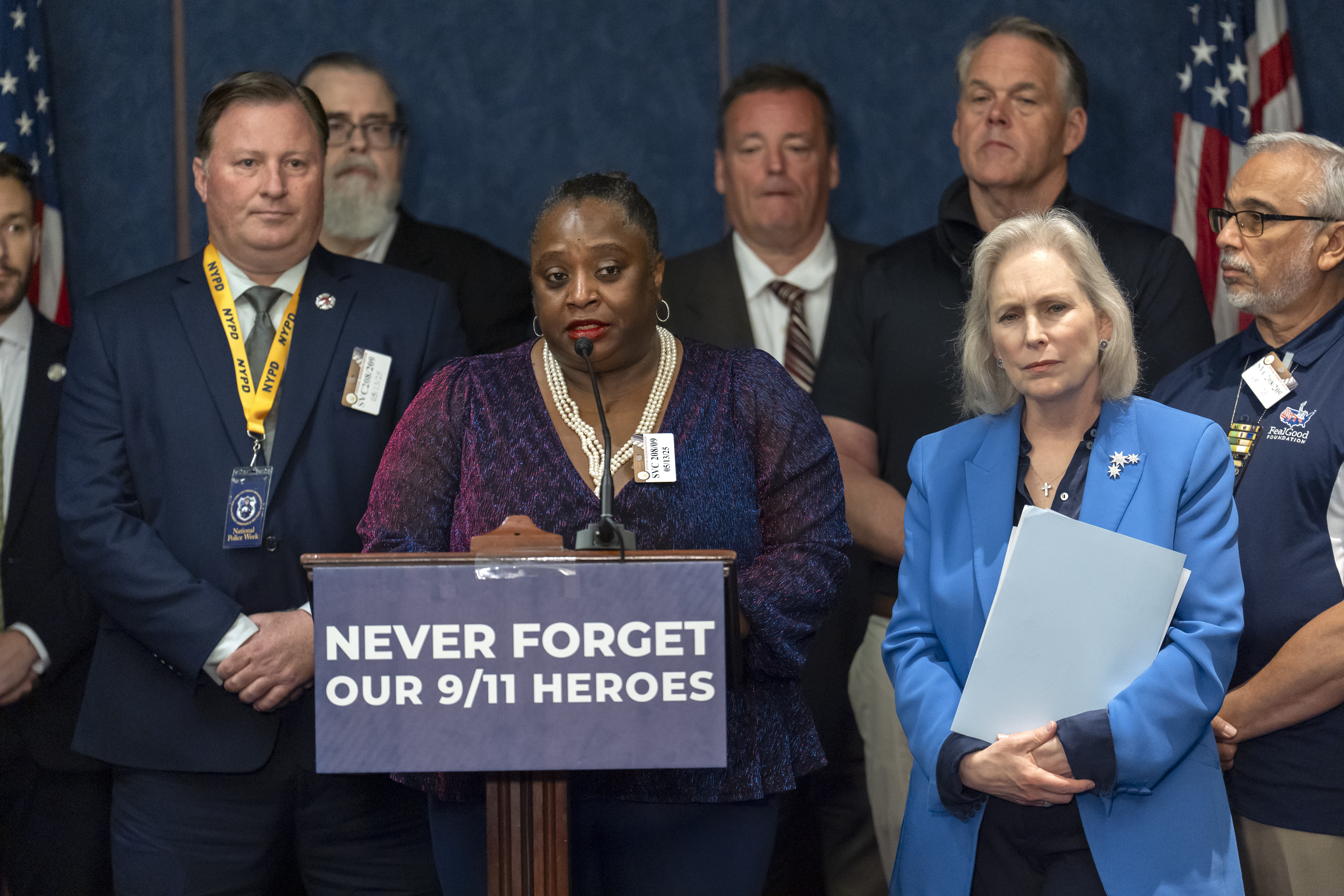Mariama James, a 9/11 survivor, speaks at a news conference last year to protest cuts to the World Trade Center Health Program. (Mark Schiefelbein/AP)