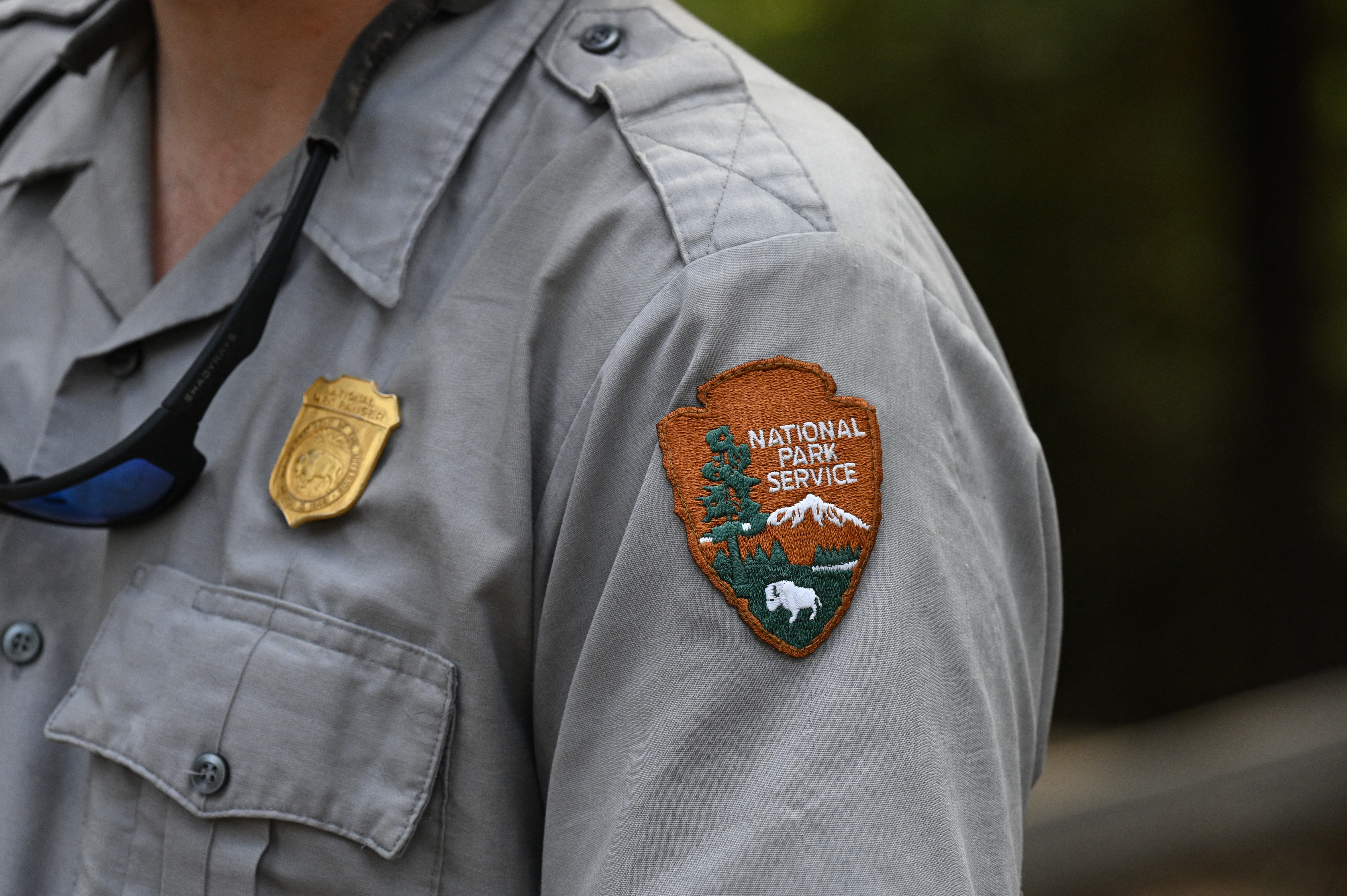 The National Park Service badge on a staff member’s uniform. (Robyn Beck/AFP/Getty Images)
