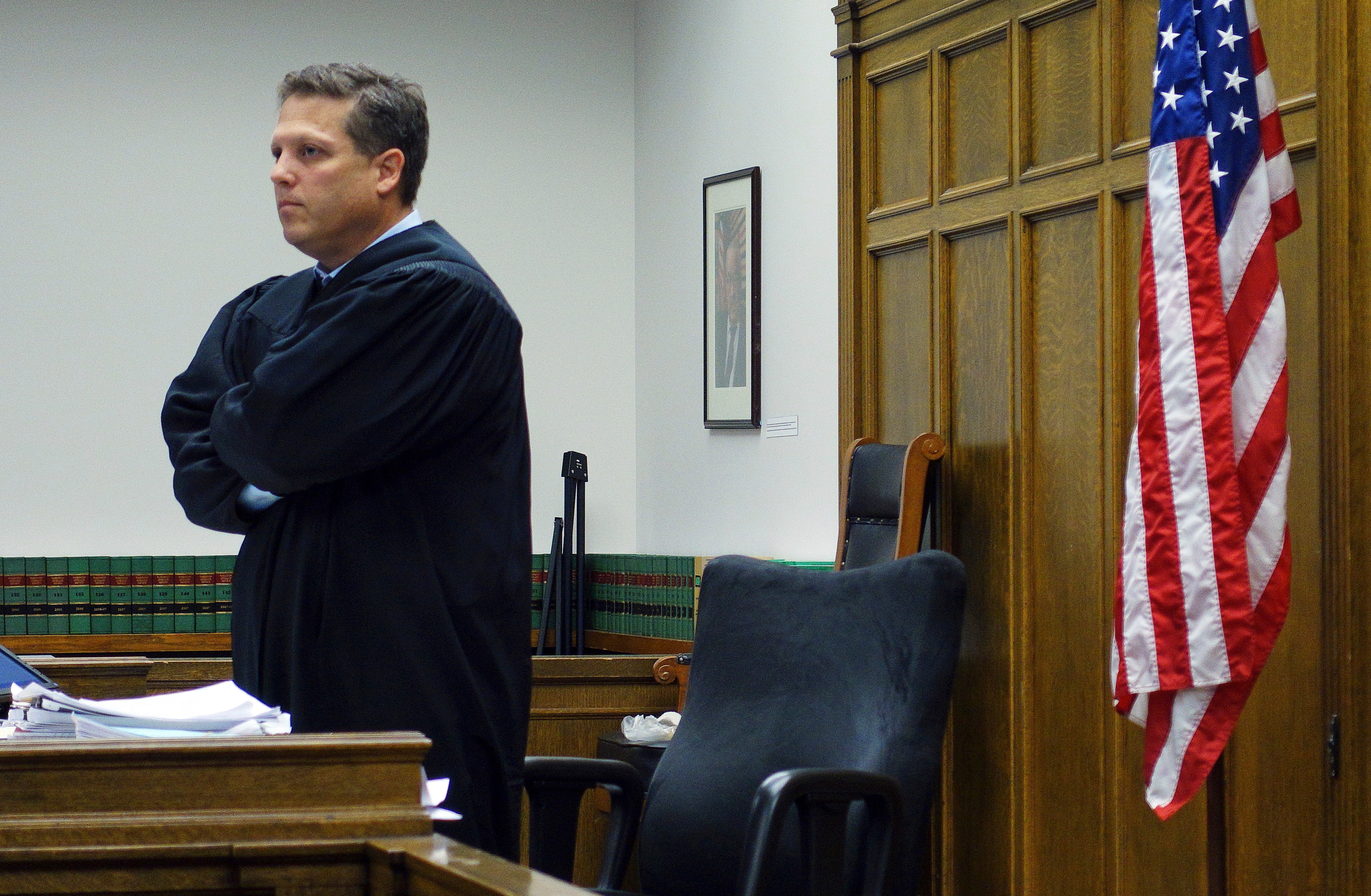 Roger Rogoff, then a Washington state judge, stands in a Seattle courtroom in 2016. (Ted S. Warren/AP)