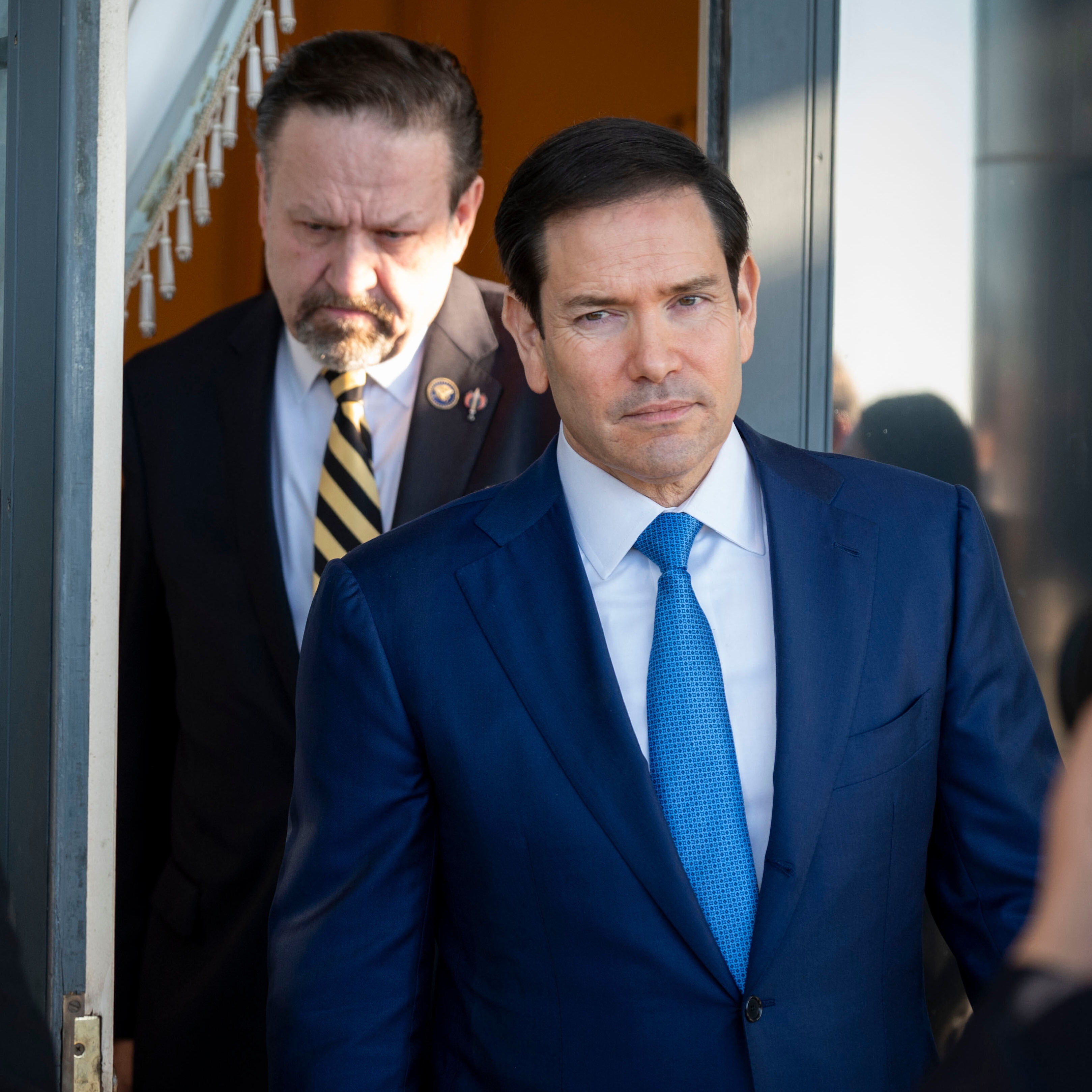 Secretary of State Marco Rubio, right, flanked by Sebastian Gorka, the Trump administration's counterterrorism czar, attends a State Department ceremony in March. (Kevin Wolf/AP)
