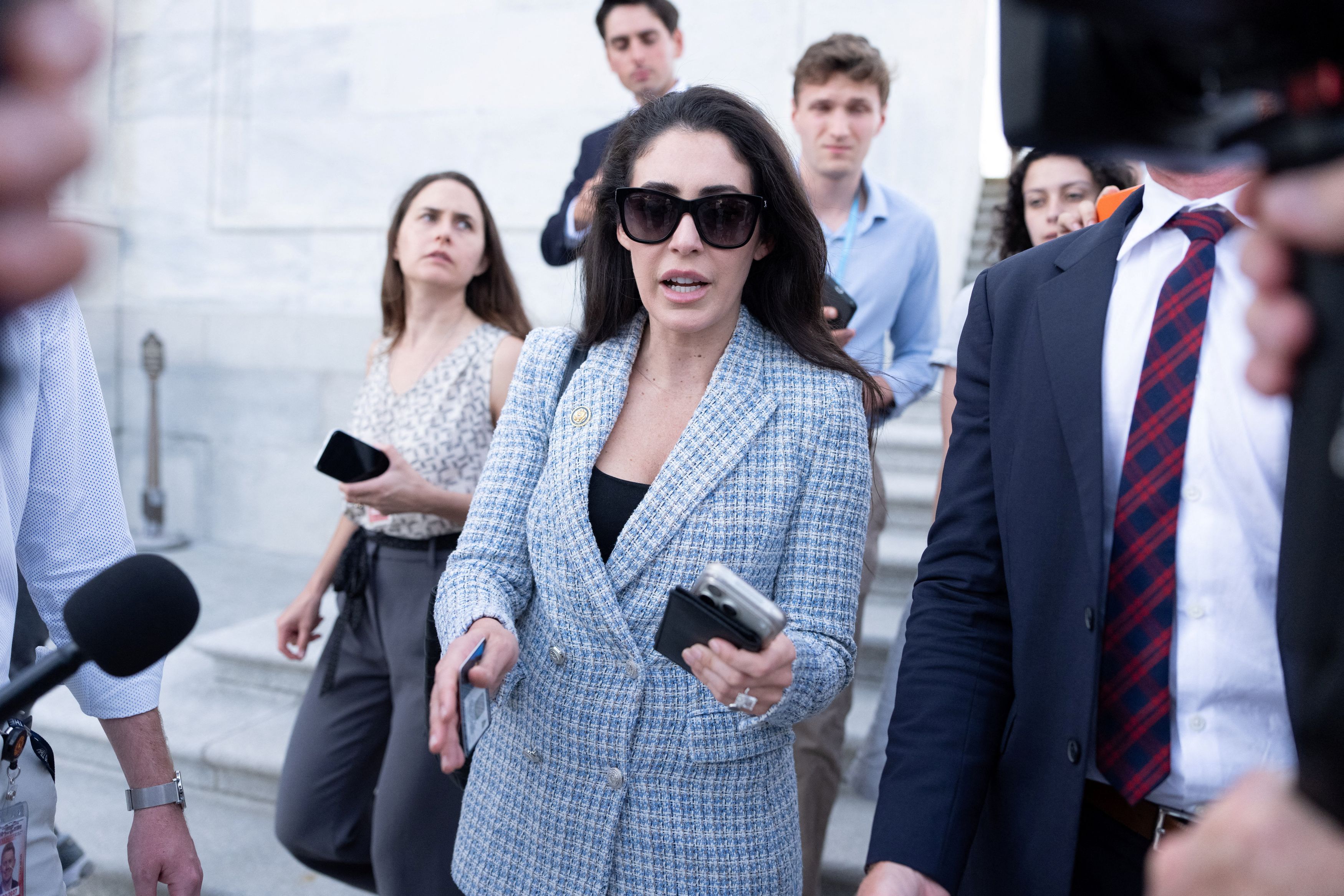 Rep. Anna Paulina Luna (R-Florida) speaks to the media outside of the U.S. Capitol on June 30. (Aaron Schwartz/Reuters)