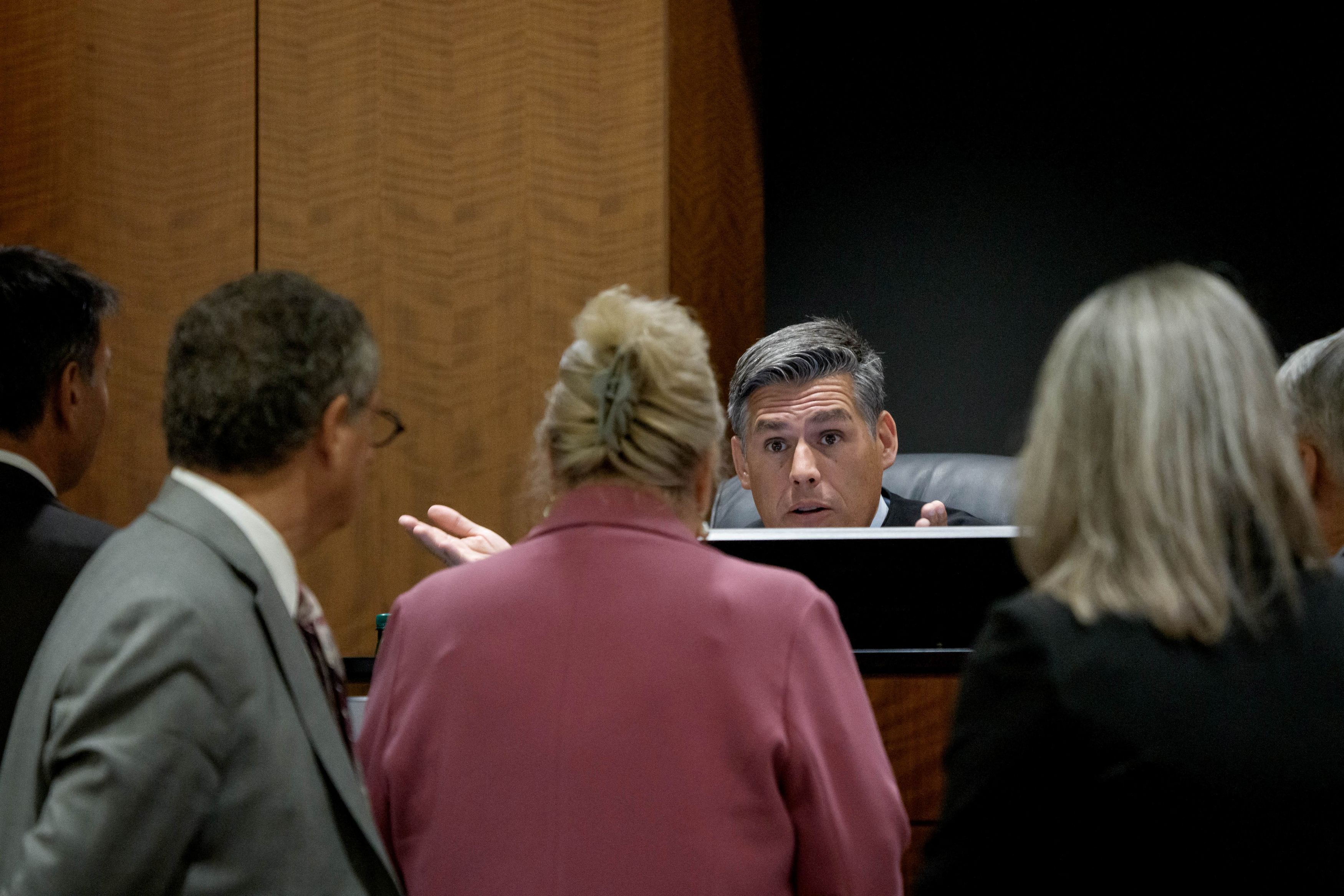 Judge Tony Graf conferences with attorneys during a preliminary hearing for Tyler James Robinson. (Spenser Heaps/via REUTERS)