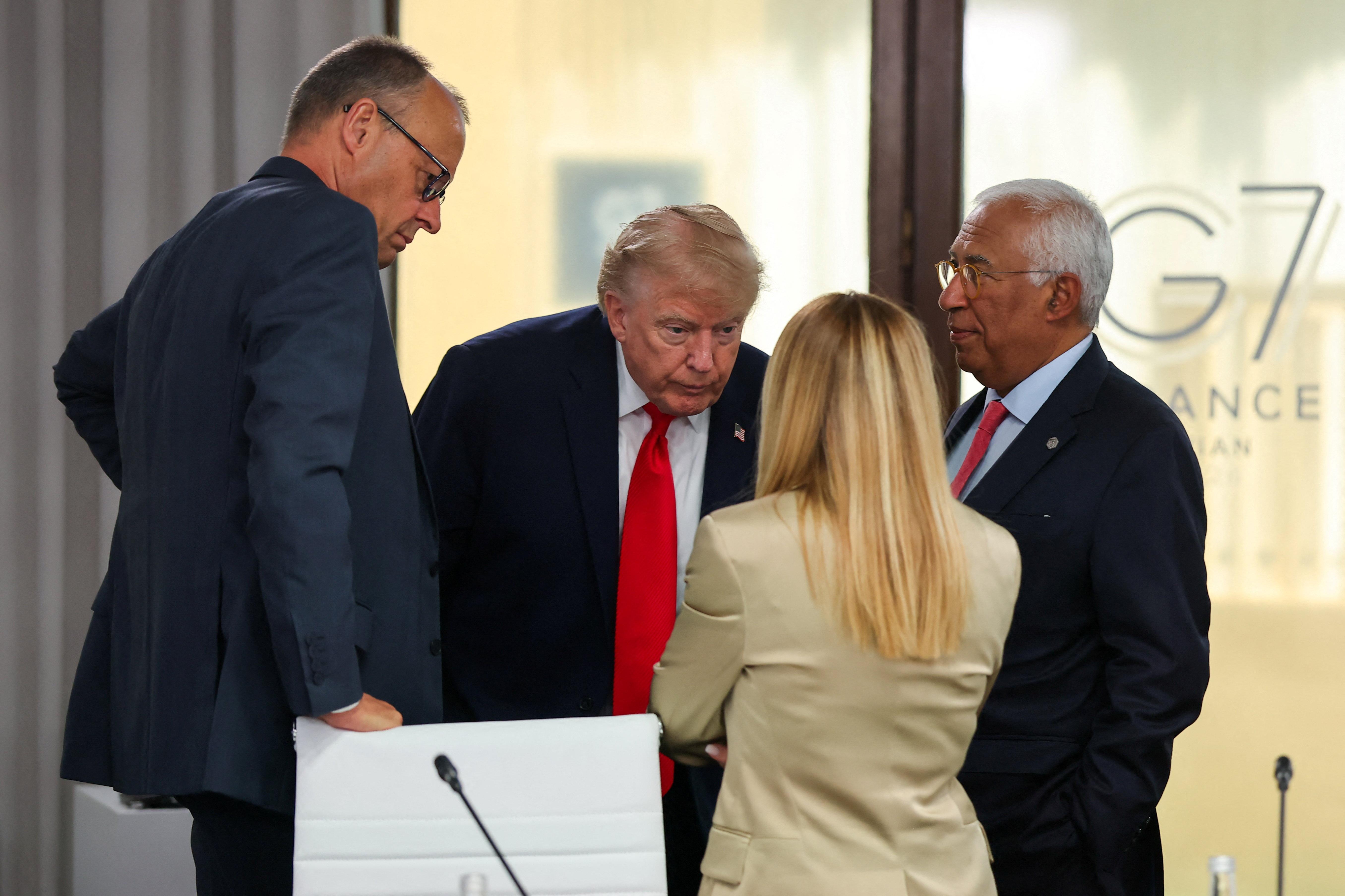 President Donald Trump, Germany's Chancellor Friedrich Merz, European Council President Antonio Costa and Italy's Prime Minister Giorgia Meloni at the Group of Seven summit in France on Tuesday. (Christian Hartmann/Pool/Reuters)