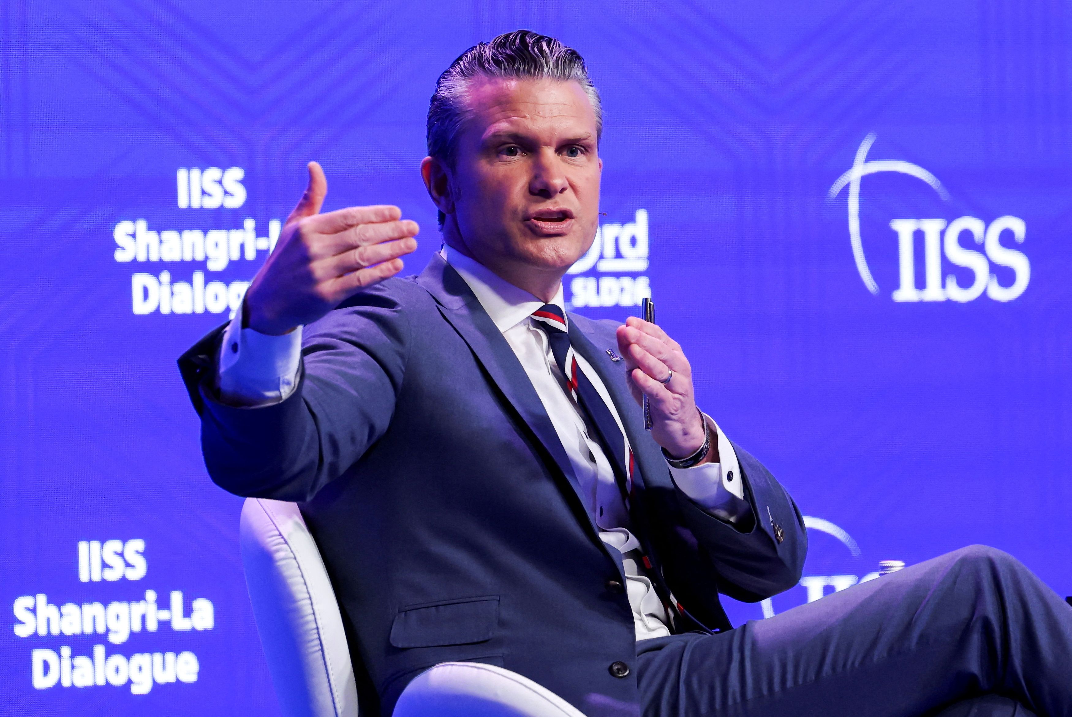 Defense Secretary Pete Hegseth speaks at the Shangri-La Dialogue security summit in Singapore on May 30. (Edgar Su/Reuters)