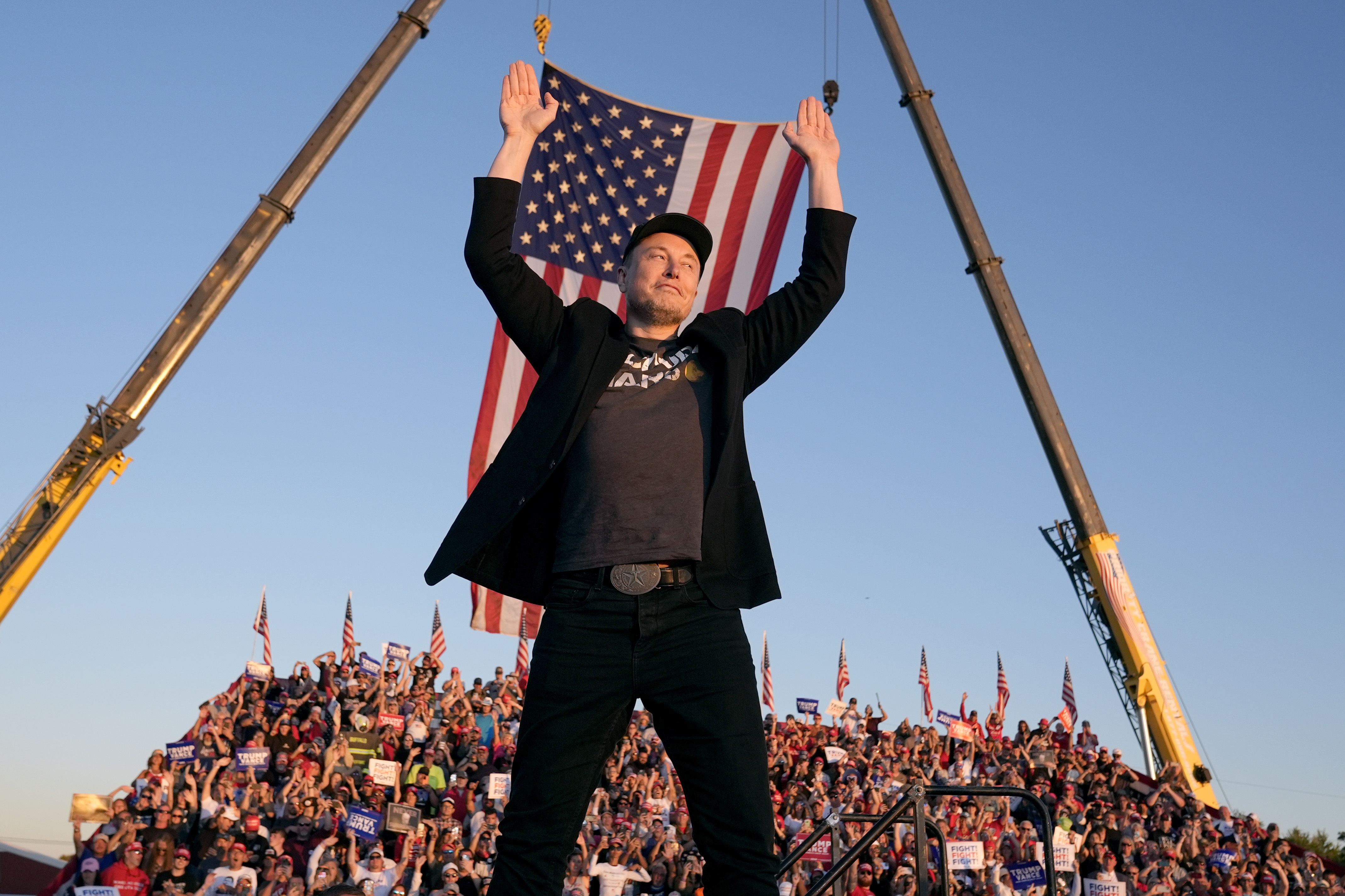 Tesla and SpaceX CEO Elon Musk greets the crowd at the Butler Farm Show in Butler, Pennsylvania, in October 2024. (Alex Brandon/AP)