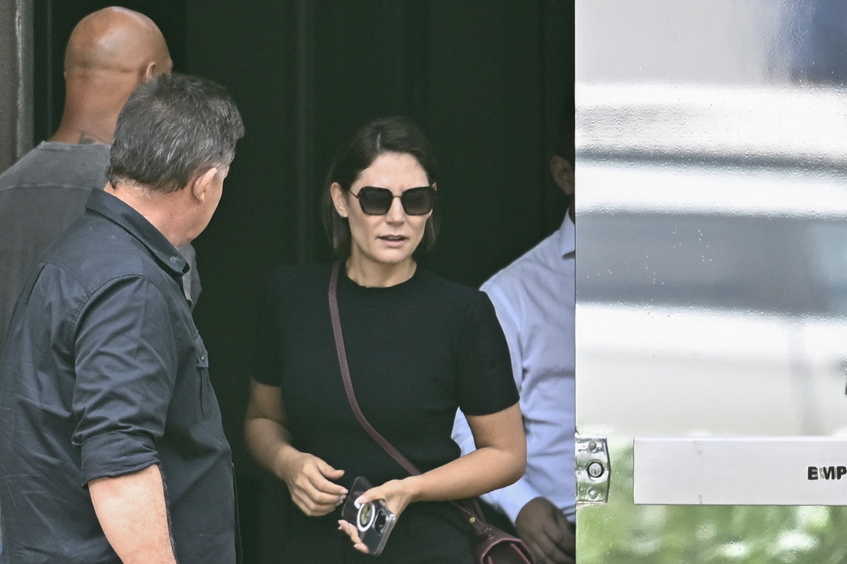 Michelle Bolsonaro leaves police headquarters in Brasília after visiting her husband, former president Jair Bolsonaro, in December. (Ton Molina/AFP/Getty Images)